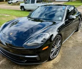 Glossy black Porsche sports car
